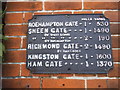 Ancient direction sign on Robin Hood Gate