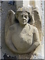 Stone angel by the west door of the Church of St. Augustine, Broxbourne