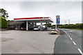 SD0899 : Esso filling station on the A595 by David P Howard