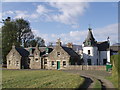 The game larder and servants quarters at the rear of Letterewe House