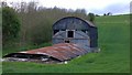 Corrugated iron agricultural buildings, partially demolished