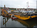 NZ8910 : Whitby Townscape : Dredging The Harbour by Richard West