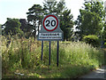 TG1514 : Taverham Village Name sign on Ringland Road by Geographer