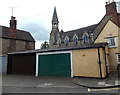 Lockup garages and a church spire, Malmesbury