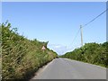 SX6048 : Warning of road narrowing near Battisborough Cross by David Smith