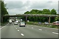 A farm track crosses the M6