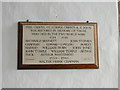 TF9932 : The War Memorial plaque in Barney church by Adrian S Pye