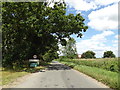 TM1369 : Entering Thorndon on Thwaite Road by Geographer