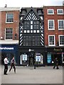 Timber building facade to a mobile phone store