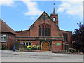 The west face of St James with Holy Trinity