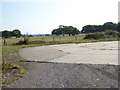 Semicircular paved area with view across fields at barracks