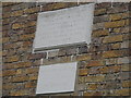 Plaques on barn wall