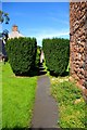 NY5536 : St Cuthbert's church path by Tiger
