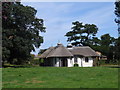 Ornate thatched building close to Roxton House