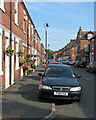 Flower baskets in Glapton Road