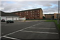 Lidl car park and tenement