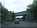 A449 Stafford Road passes under railway bridge