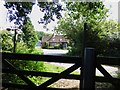 Bridleway reaches the buildings at Woodshill Farm