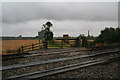 Across the tracks to Fieldhouse Farm, North Kelsey Moor