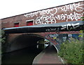 Graffiti covered bridge on the Grand Union Canal