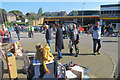 Two cuddly animals watch the Car Boot Sale at Tring