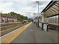SJ9598 : Passing through Stalybridge Station by Gerald England