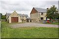 Housing at Lower Farm: converted barn and farmhouse