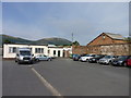 Malvern Hills behind work units at Barnard