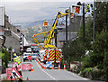 SH6135 : Replacing overhead cables in Talsarnau High Street by Arthur C Harris