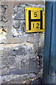 Benchmark and hydrant sign on Toll Tower