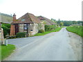 Looking along Selden Lane past buildings at Selden Farm