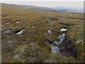 NJ0706 : Peat hags north of Coire Riabhach Bheag by Graham Robson