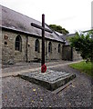 Cross and poppy wreath outside St Paul