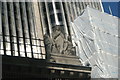 View of a family of statuettes on the roof of the Gibson Hall