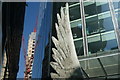 View of the top of the feather sculpture on Threadneedle Street