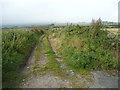 Hassocks Road at the end of the tarmac, Meltham