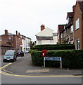 Postbox in a Warwick hedge