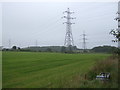 Farmland and pylons near Heathlands Farm