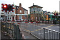 Crawley signal box with train approaching level crossing