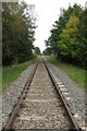 Railway line heading to the Claydons