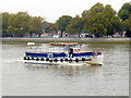TQ2877 : Boat passing Battersea Park by PAUL FARMER