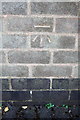 Benchmark on wall between house and garage of #53 Greenwood Road