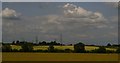 Fields and pylons north of the railway at Weston