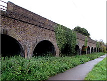 SU9678 : Path alongside a railway viaduct, Eton by Jaggery