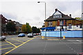 Boarded up shop on the corner of Holmesdale Road