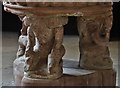 Crick: St. Margaret of Antioch church: One of 3 monsters "straining to support" the Norman font