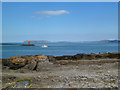 SH6481 : Penmon - Perch rock and the rocky beach by Oliver Mills