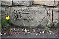 Benchmark on wall of Brimington Road