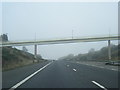 M65 eastbound crossed by footbridge