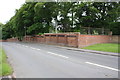 Cemetery wall beside B5299